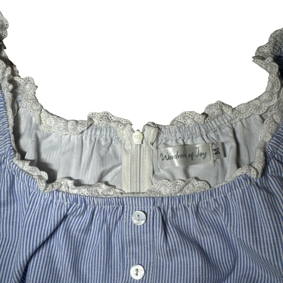 Gemstoresg blue and white striped peplum blouse with square neckline, delicate lace trim, and button-down front