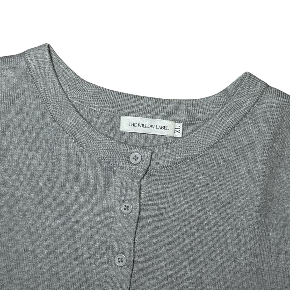 Gemstoresg heather grey short sleeve button down knit top with a classic crew neckline and fine-gauge texture.