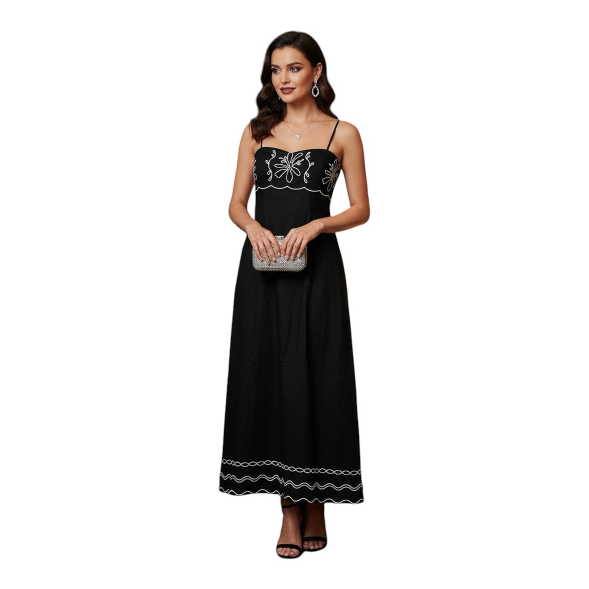 Gemstoresg navy maxi dress with white floral embroidery, square neckline, and spaghetti straps on a female model