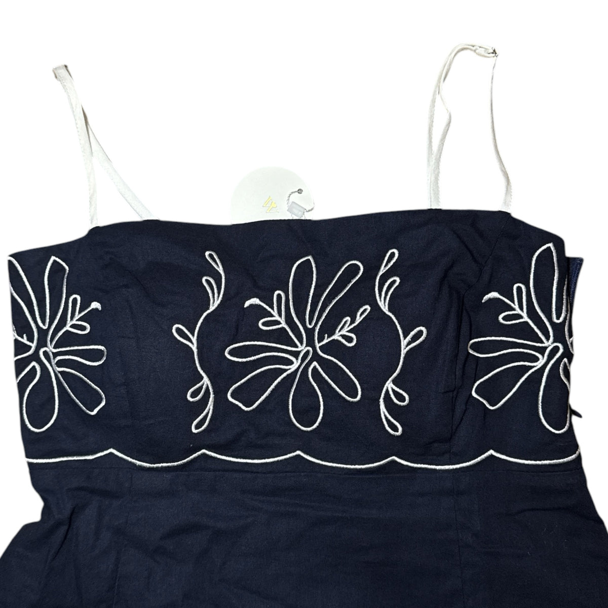 Gemstoresg navy midi dress with white floral embroidery, square neckline, and adjustable spaghetti straps.